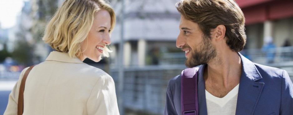 man and woman smiling at each other